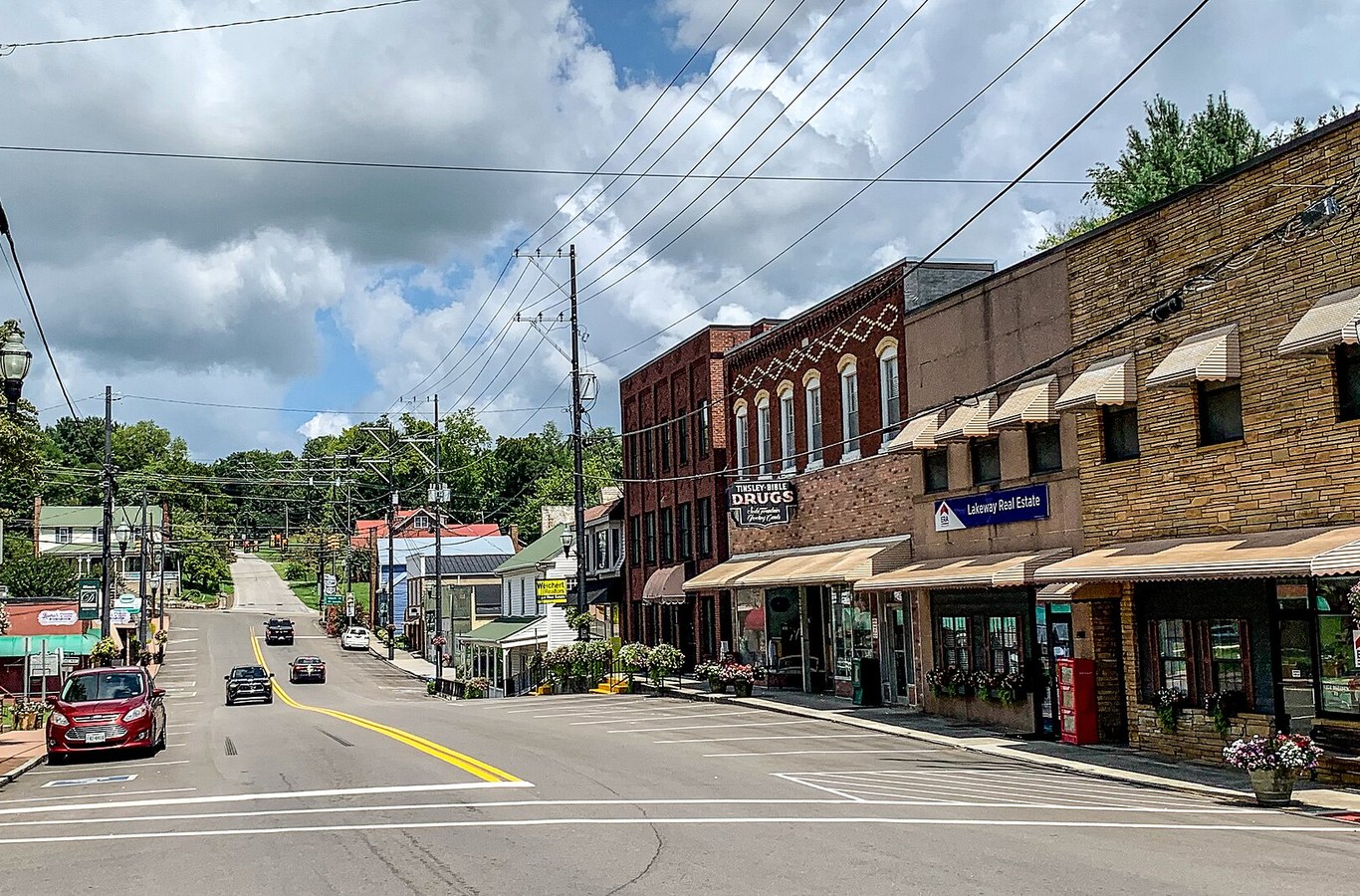 Storefronts along Gay Street in downtown Dandridge, TN, on a sunny day
