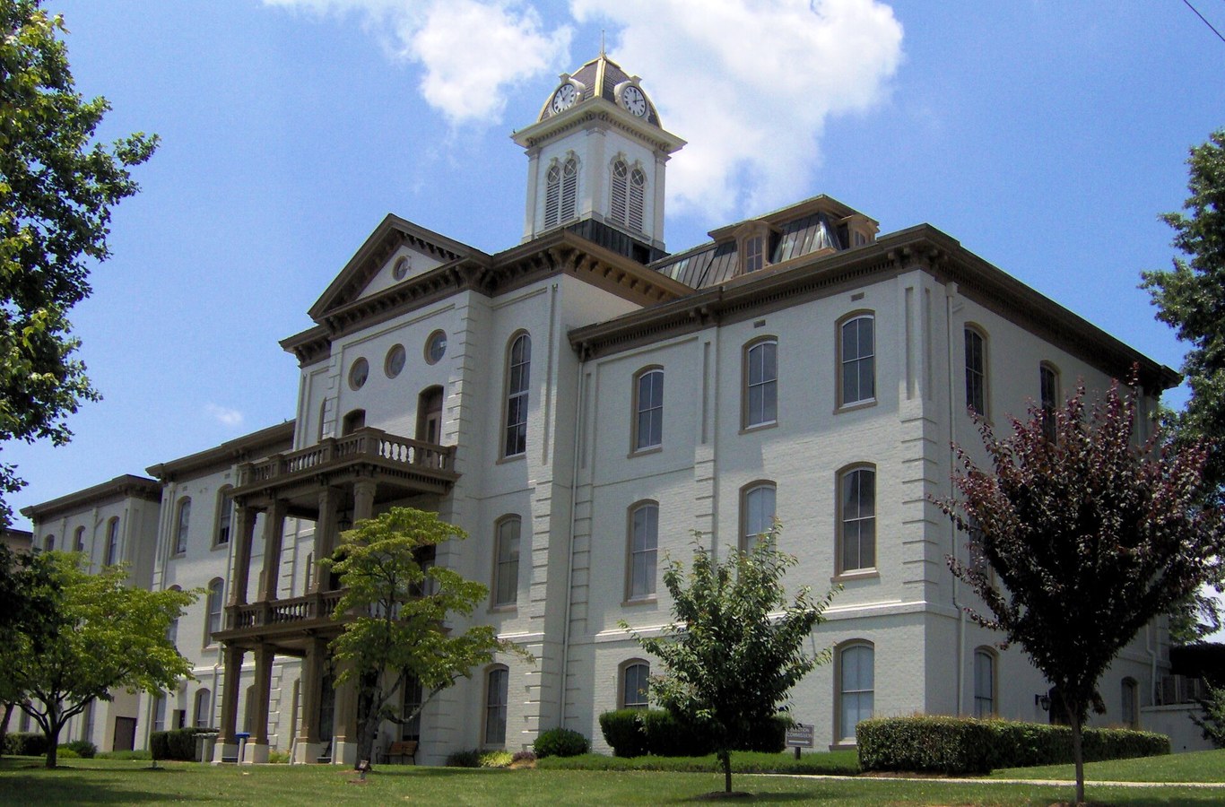 Hamblen County Courthouse in Morristown, TN, a white courthouse with a two-story portico and a cupola