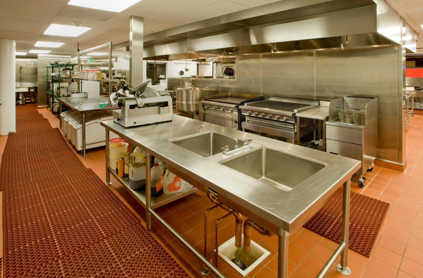 Commercial kitchen with steel sinks and prep tables, the business drains Starling Plumbing serves in Morristown, TN