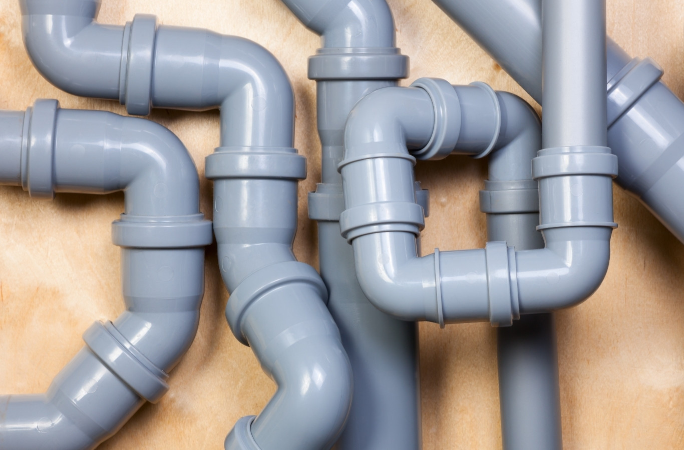 Grey PVC drain fittings for a job, parts used by Starling Plumbing in Blaine, TN. Drain & Sewer Services Near Me.